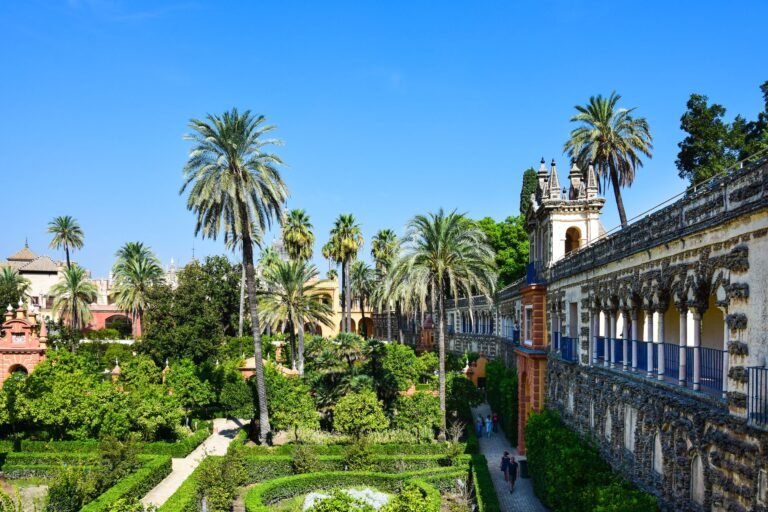 Explore the Royal Alcázar of Seville, Spain, with gardens and iconic architecture