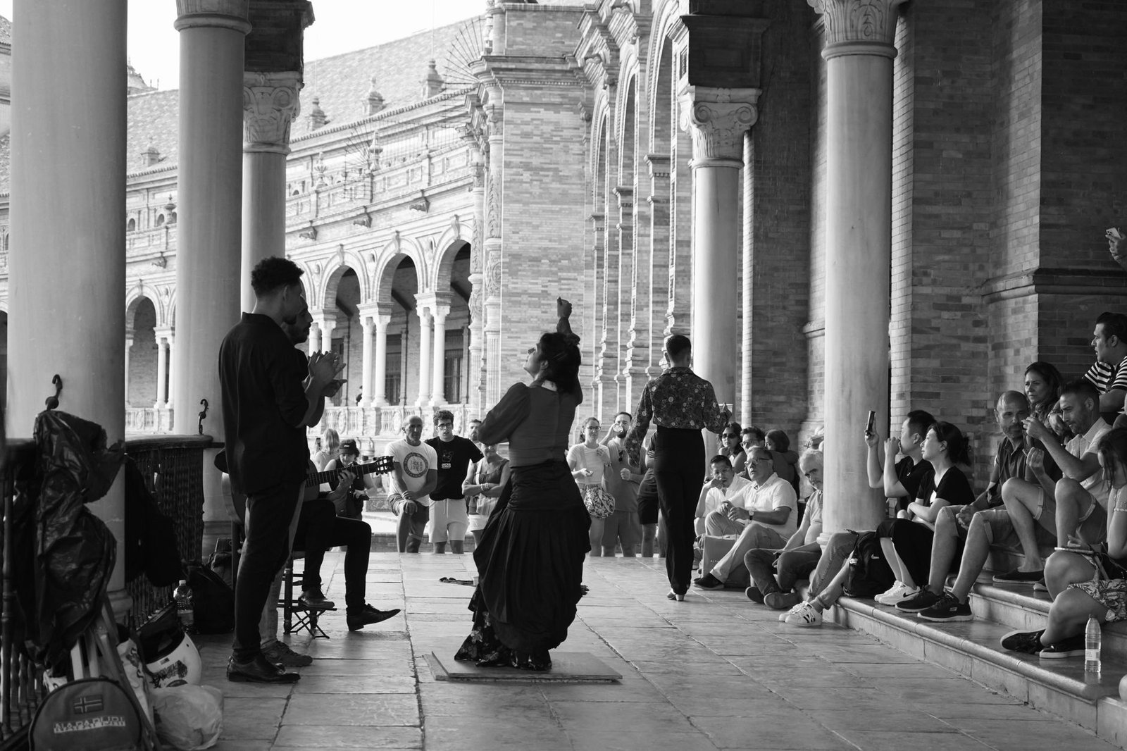 Traditional flamenco dancers performing in Plaza de España, Seville, Spain