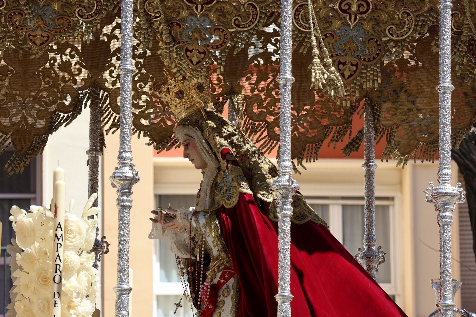 Intricate religious procession during Semana Santa in Cádiz, showcasing traditional Spanish heritage