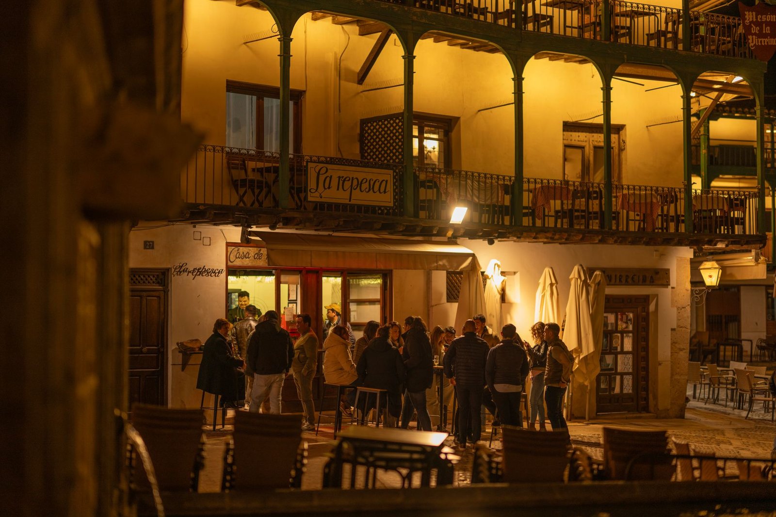A evening atmosphere at a traditional Spanish plaza in Chinchón, Madrid