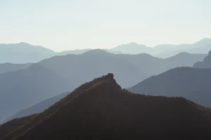 view of mountain ranges with a misty atmosphere at sunrise in Spain, showcasing natural beauty