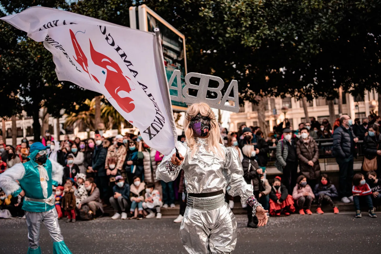 Colorful costumes and atmosphere during a street parade in A Coruña, Spain