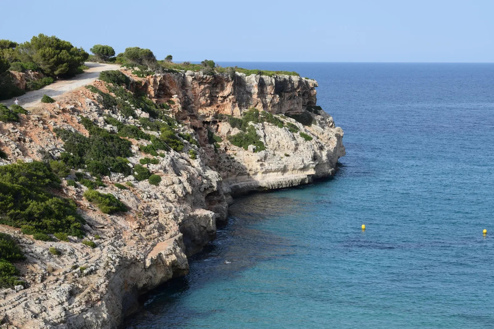 view of cliffside and turquoise sea along the Mediterranean coast