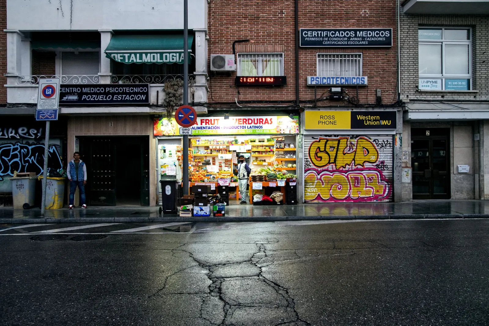 urban scene with graffiti and fruit store in Pozuelo de Alarcón