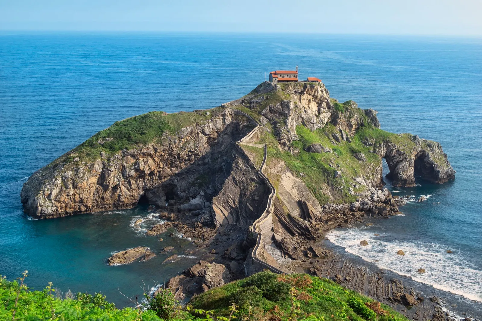 A view of San Juan de Gaztelugatxe island and its winding path in Spain's Basque Country