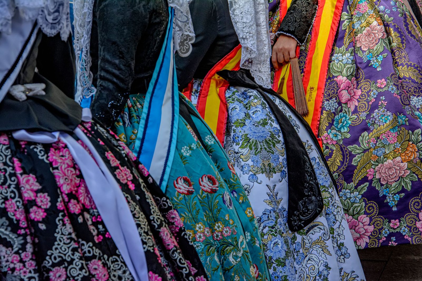 close-up of traditional embroidered dresses at Alicante festival