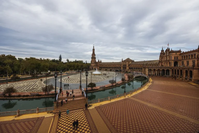 A aerial view of Plaza de España in Seville, showcasing its architecture and grandeur