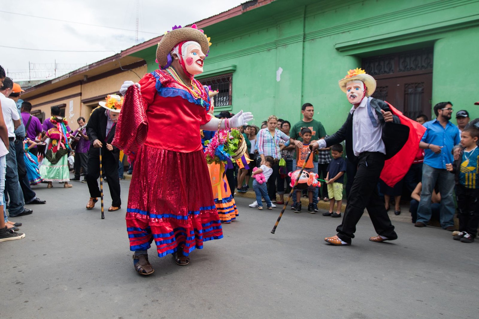 Colorful costumes and traditional dances at the San Sebastian Festival parade in Diriamba, Nicaragua