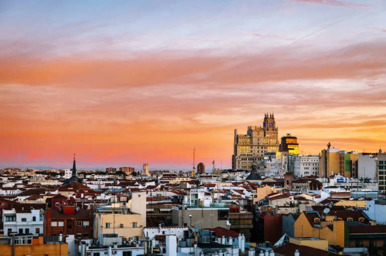 view of Madrid's skyline at sunset showcasing iconic architecture and sky